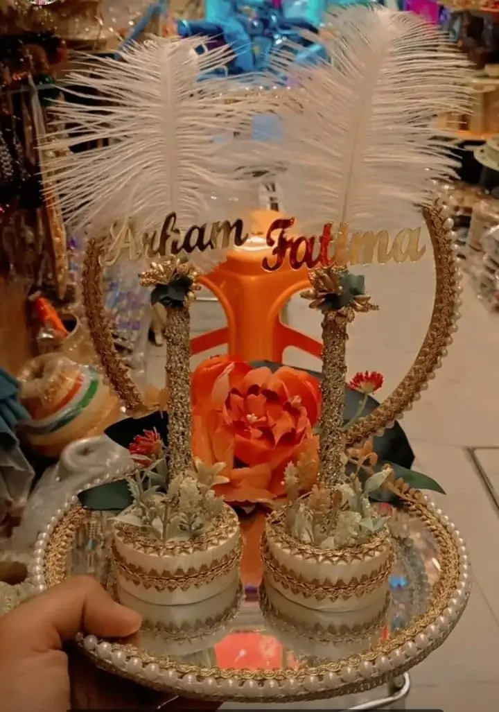 Name stand with feathers