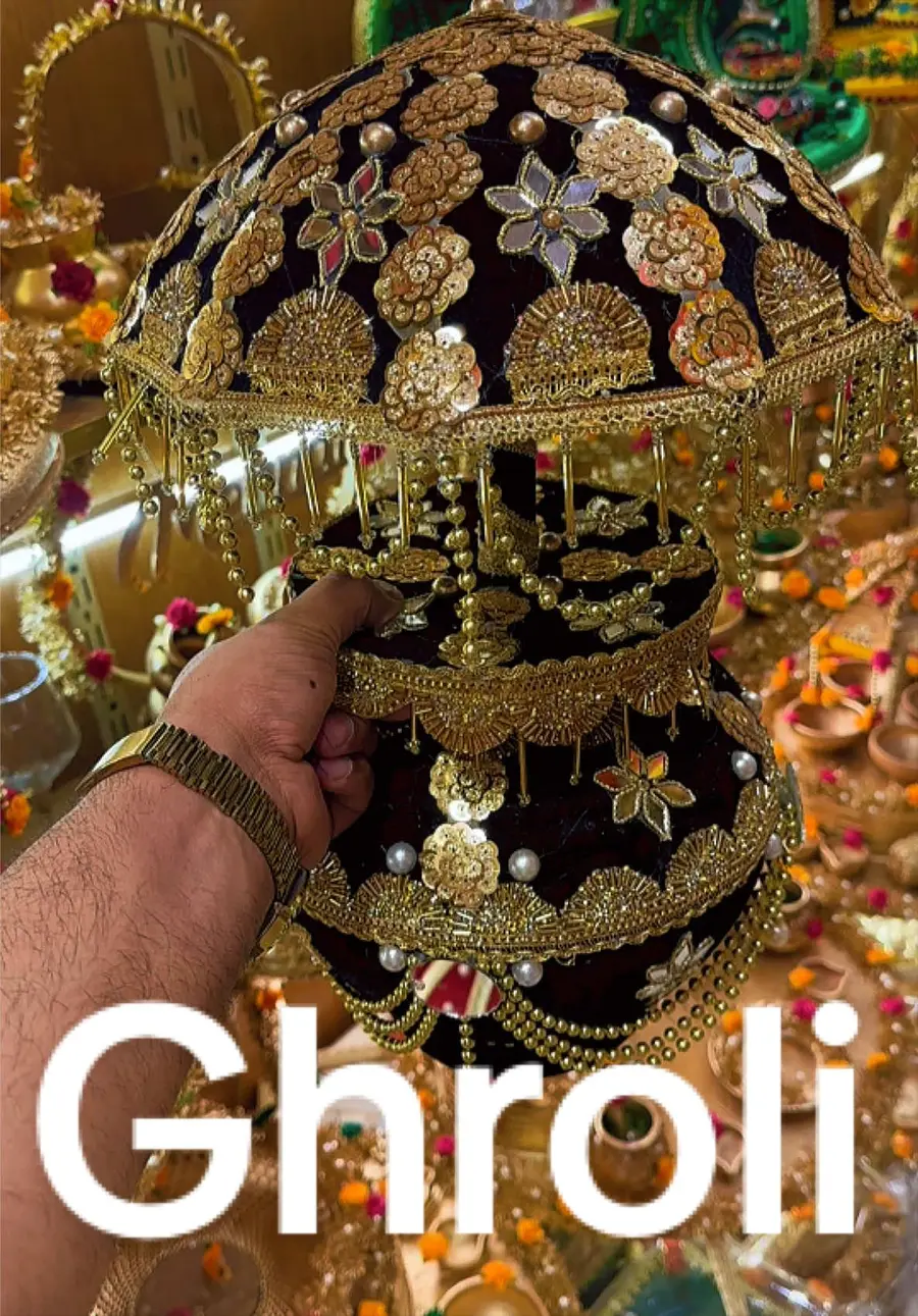 Velvet ghroli covered in gold gota